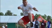 Special Olympics Florida Summer Games A man practices a long jump