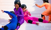 Contestants competing in Slippery Stairs