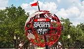 EPSN Wide World of Sports logo on world globe signage outside of the sports complex.
