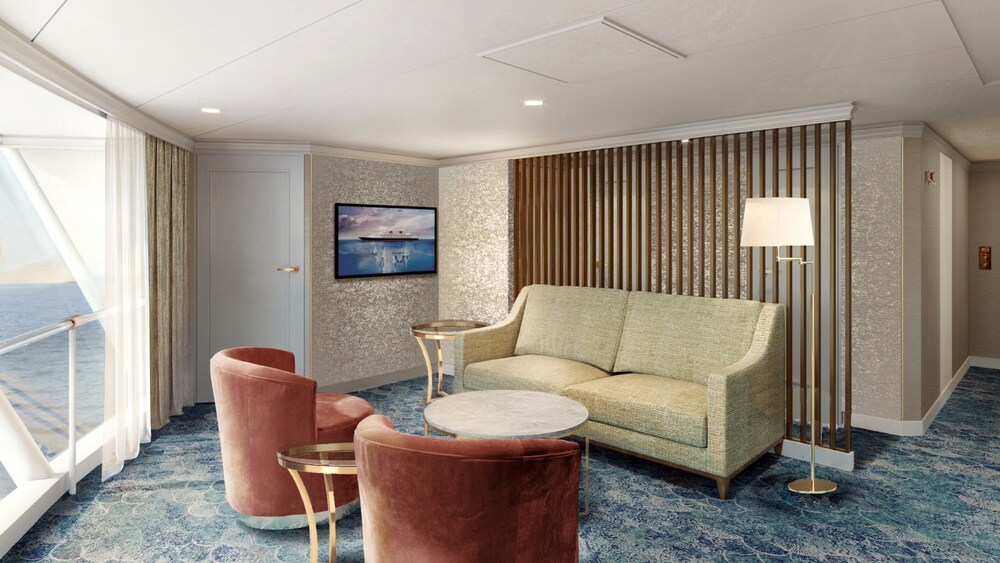 An artist rendering of a Disney Wish Concierge Family Oceanview Stateroom with a TV, sofa, table, 2 chairs and a large window with an ocean view