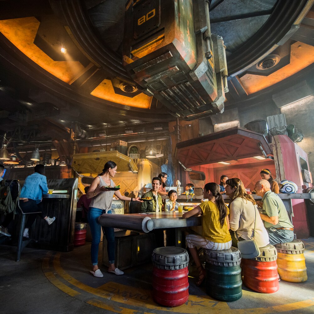 A large group eating at the Black Spire Outpost eatery at Star Wars Galaxy's Edge 