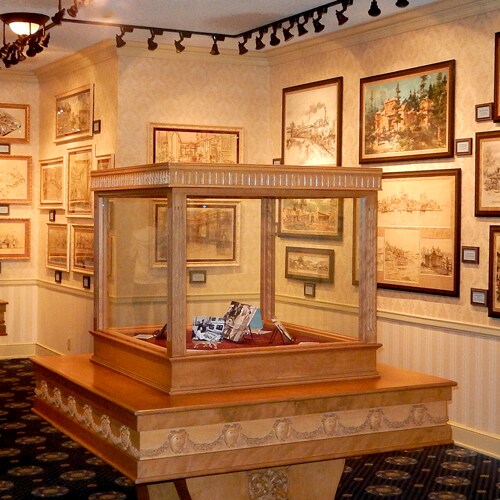 Artifacts and paintings are displayed in the Disney Gallery