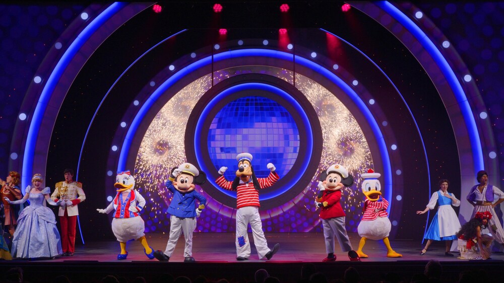 The Disney Seas the Adventure stage show featuring Captains Mickey Mouse and Minnie Mouse, and Sailors Donald Duck, Daisy Duck and Goofy along with other Disney Characters