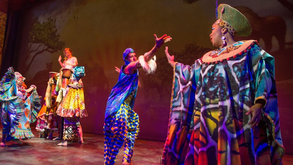 Cast Members wearing 'The Lion King' inspired clothing during Disney Dreams, An Enchanted Classic