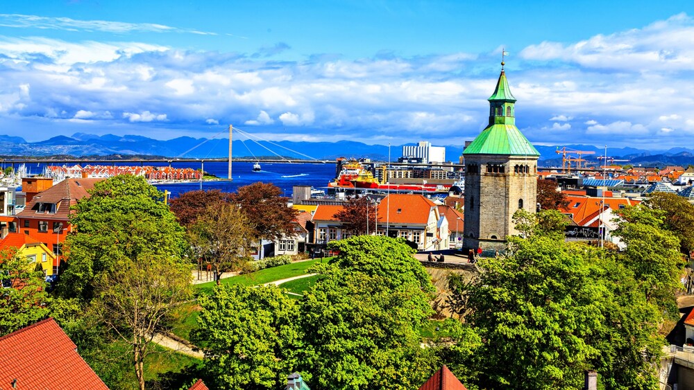 A lush cityscape of Stavanger, Norway with the Valberg tower