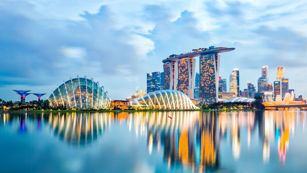Gardens by the Bay and the Marina Bay Sands Singapore Hotel at night