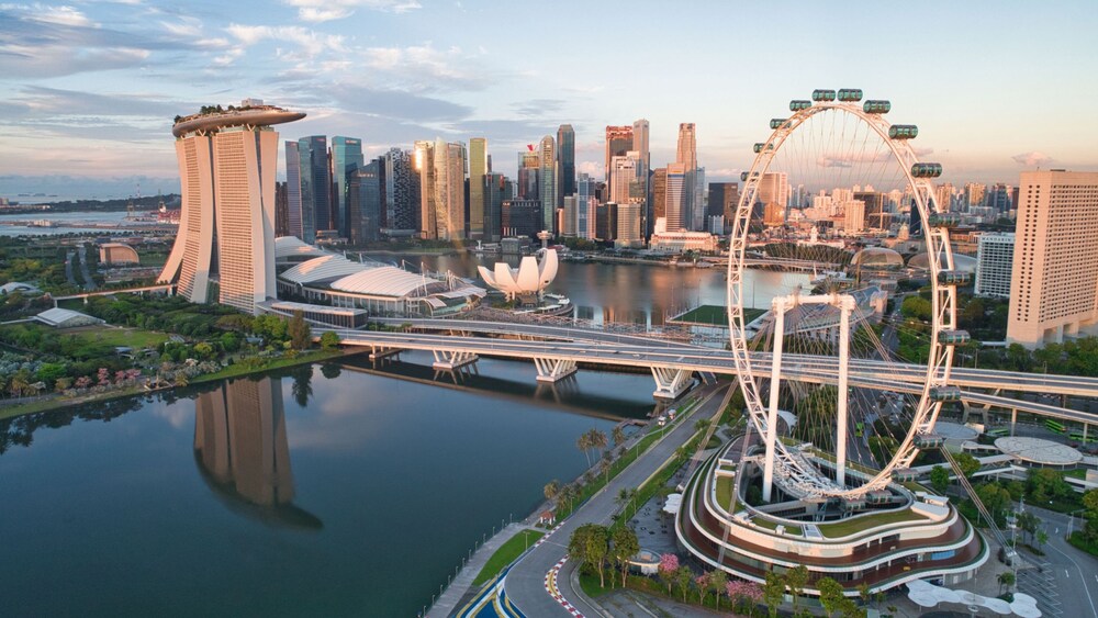 The Marina Bay Sands Singapore Hotel and the Singapore Flyer observation wheel at Marina Bay