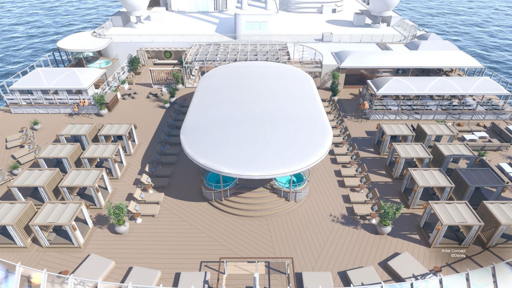 An artist rendering of the Concierge Lounge on the Disney Adventure featuring a sun deck with cabanas, lounge chairs, a bar and shaded whirlpools