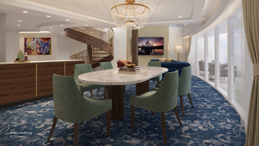 A dining room with 6 chairs inside of The Beauty and the Beast Royal Suite on the Disney Believe cruise ship