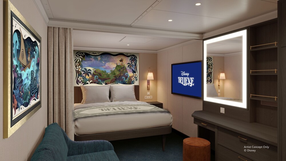 An Inside stateroom on the Disney Believe cruise ship, featuring a bed, sofa, television and vanity