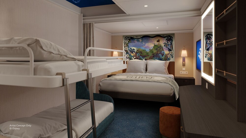 An Inside stateroom on the Disney Believe cruise ship, featuring a bed next to 2 bunk beds with decorative stars on the ceiling