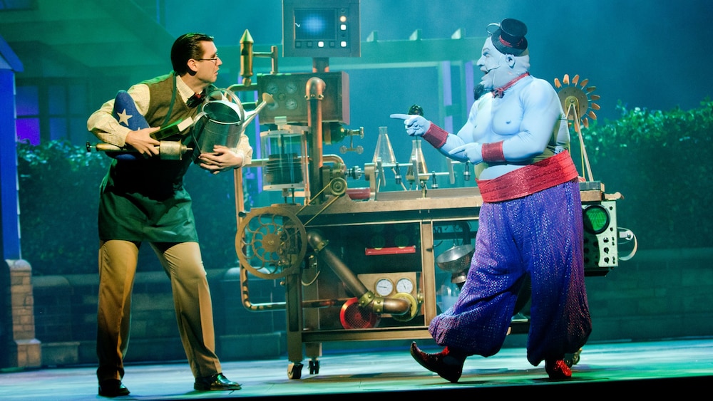 Gênio cantando para o Doutor Cornelius Greenaway durante o espetáculo ao vivo Disney's Believe