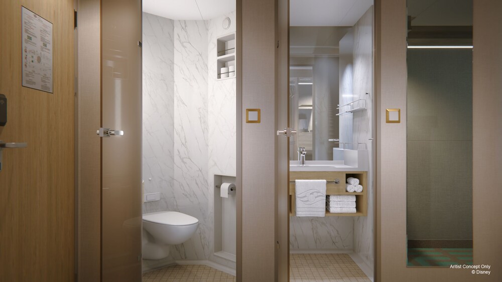 An artist rendering of a Disney Cruise Line stateroom bathroom with a toilet, sink, mirror, towels and a walk in shower