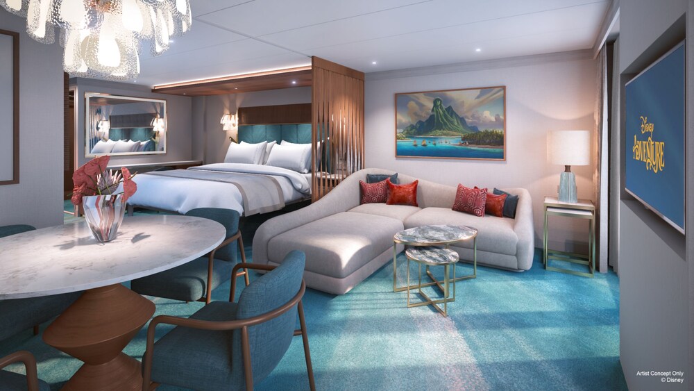 An artist rendering of a Disney Adventure Concierge Family Oceanview with Verandah Stateroom with a bed, dining table, chairs, sofa, coffee table and TV
