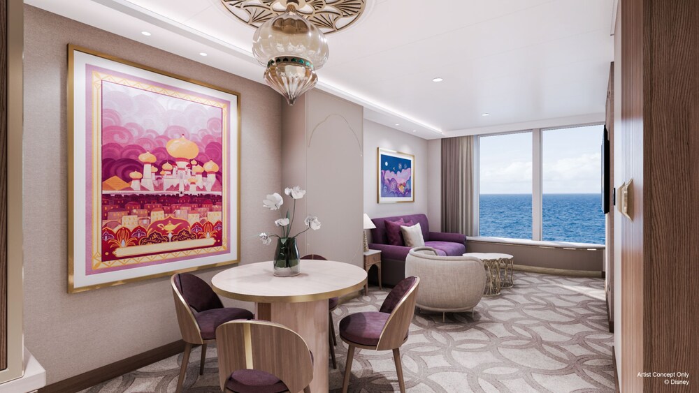 An artist rendering of a Disney Adventure Concierge Family Oceanview Suite dining area with a dining table, chandelier, artwork inspired by Aladdin, chairs and a window facing the ocean