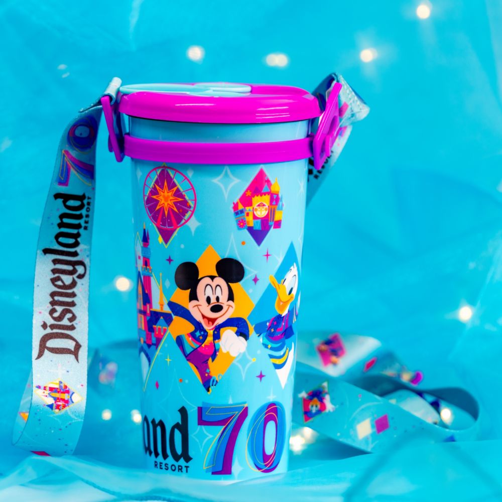 A Disneyland Resort 70th Celebration drink tumbler featuring Disney characters
