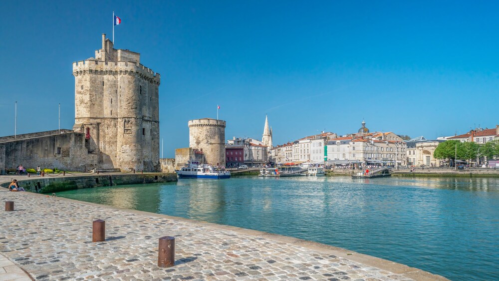 Medieval stone towers and buildings at the harbor in La Rochelle, France