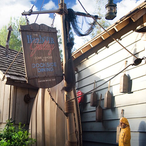 Sign: Harbour Galley Come Ashore for Dockside Dining at Disneyland Park
