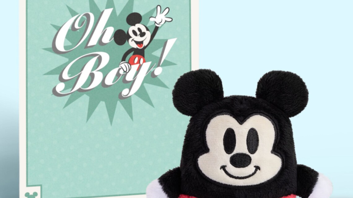 A Mickey Mouse Oh Pop Plush toy standing next to a card reading Oh, boy