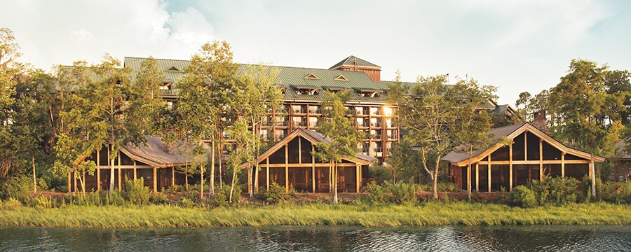 Pine trees surrounding 3 waterfront cabins at Cooper Creek Villas & Cabins at Disney's Wilderness Lodge