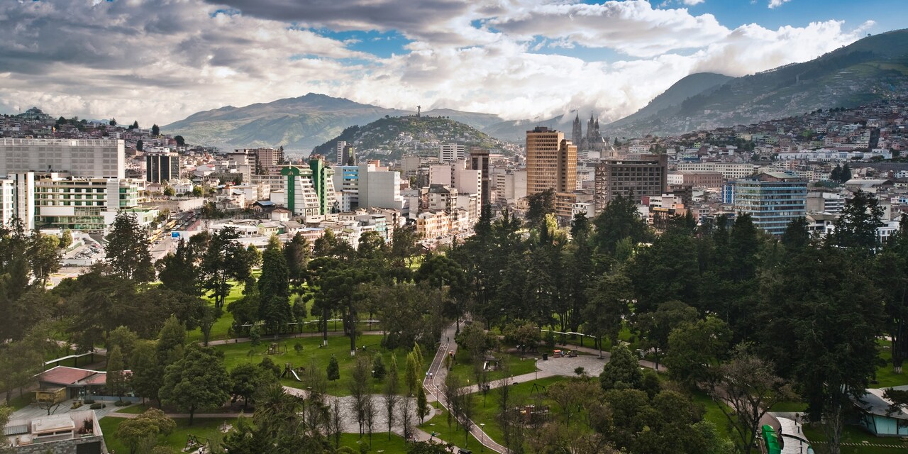 A park at the heart of downtown Quito, Ecuador surrounded by mountains and clouds A park at the heart of downtown Quito, Ecuador surrounded by mountains and clouds