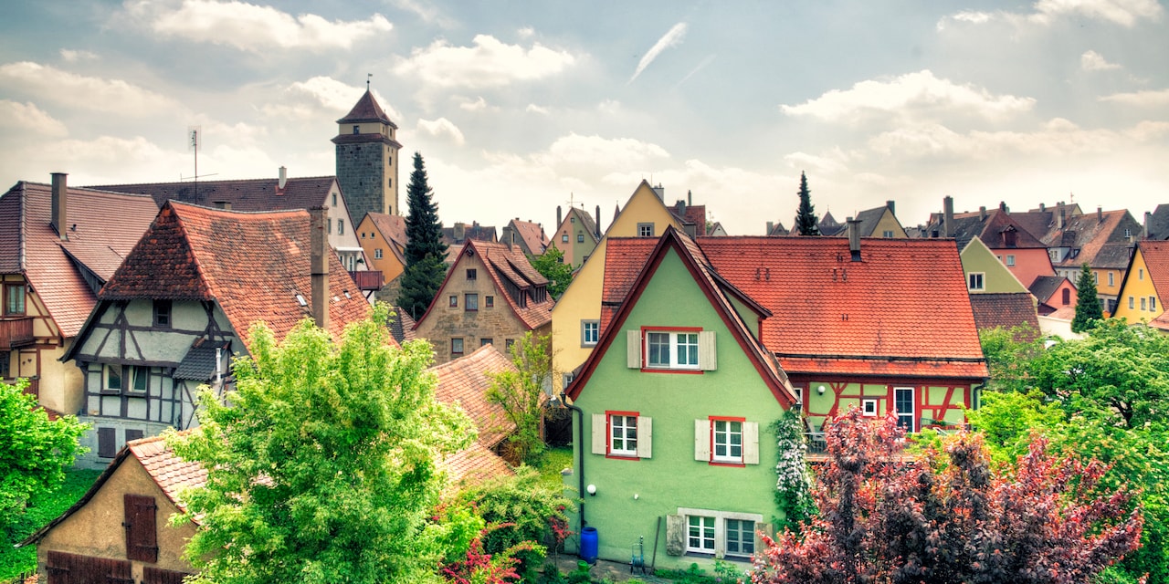 Tudor-style buildings and shops line the cobblestone streets of Rothenburg's medieval old town area Tudor-style buildings and shops line the cobblestone streets of Rothenburg's medieval old town area