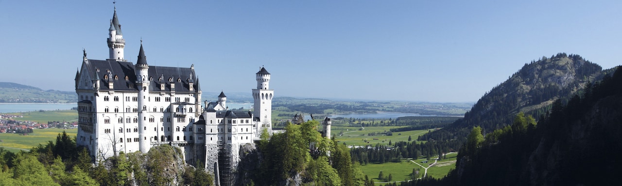 Neuschwanstein Castle atop a steep hill Neuschwanstein Castle atop a steep hill
