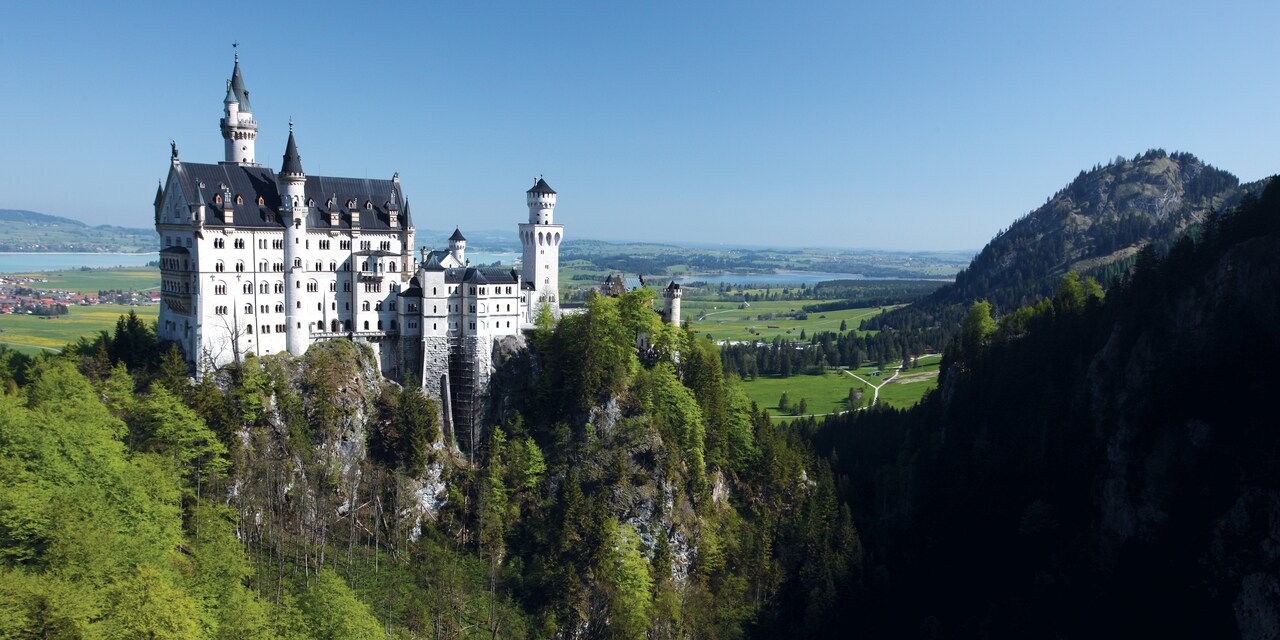 Neuschwanstein Castle atop a steep hill Neuschwanstein Castle atop a steep hill