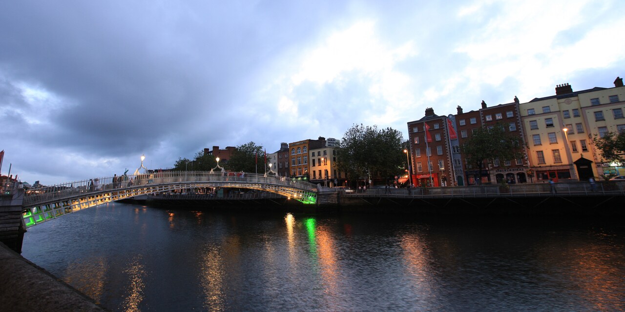 A river and small bridge in an old European city A river and small bridge in an old European city