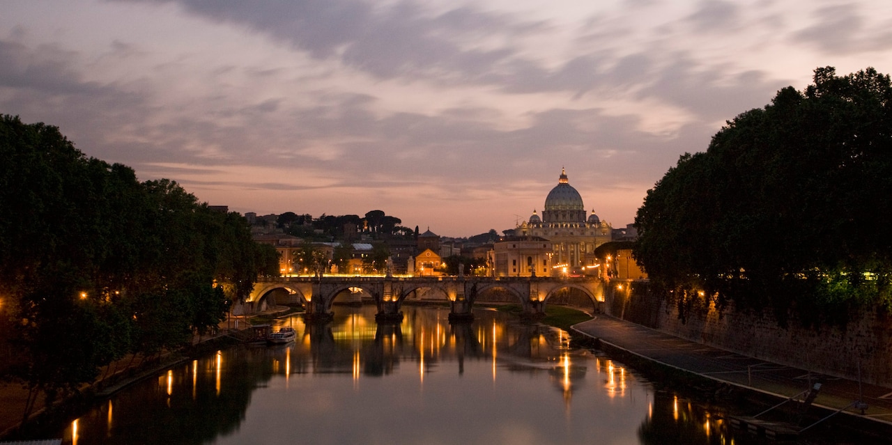 The River Tiber and St. Peter's Basilica at sunset The River Tiber and St. Peter's Basilica at sunset