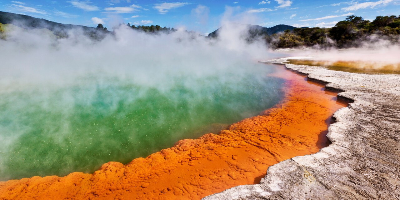 Steam rises from a geothermal hot pool