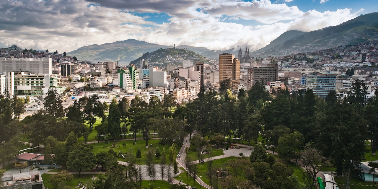A park surrounded by the city and mountains of Quito, Ecuador A park surrounded by the city and mountains of Quito, Ecuador