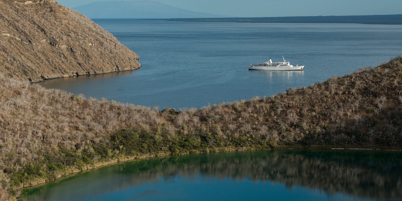 Ship in Tagus Cove off Isabela Island Ship in Tagus Cove off Isabela Island