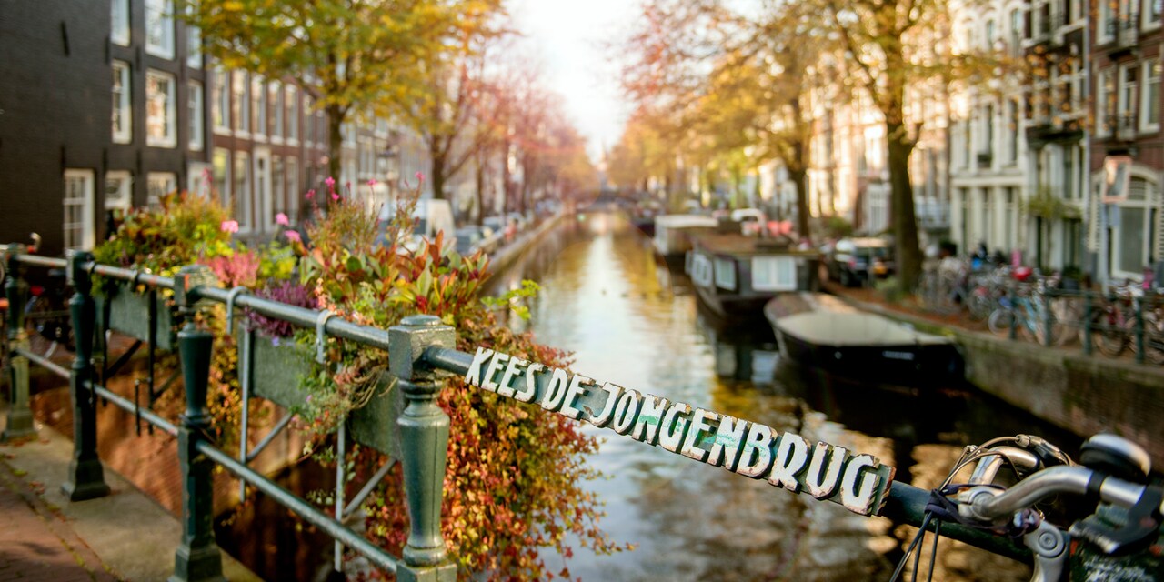 The view of the Prinsengracht Canal from the Kees de jongen brug, a bridge in Amsterdam The view of the Prinsengracht Canal from the Kees de jongen brug, a bridge in Amsterdam