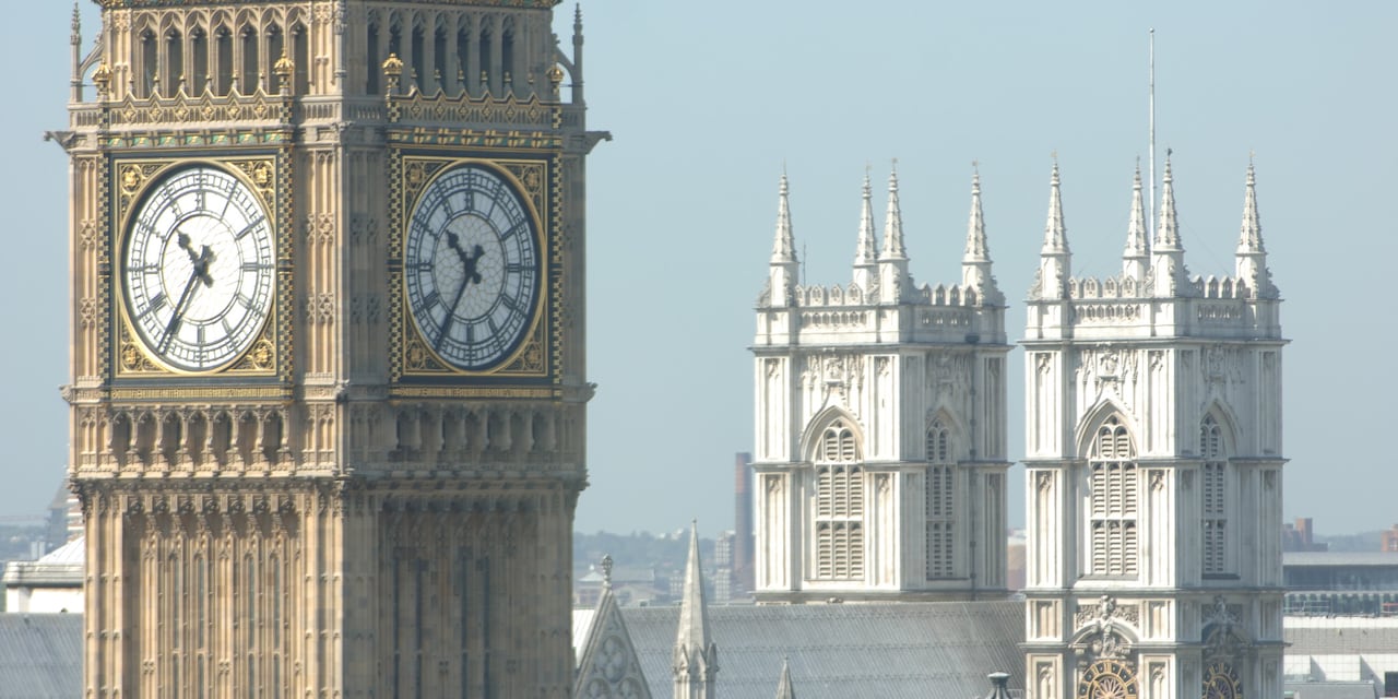 The tower clock, Big Ben, with Westminster Abbey in the background The tower clock, Big Ben, with Westminster Abbey in the background