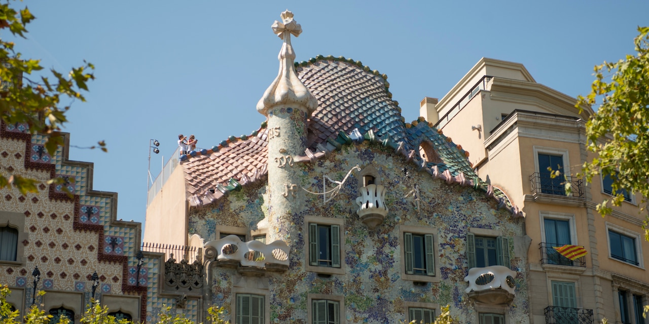 The whimsical Casa Batlló, an apartment building designed by Gaudí in his signature style The whimsical Casa Batlló, an apartment building designed by Gaudí in his signature style