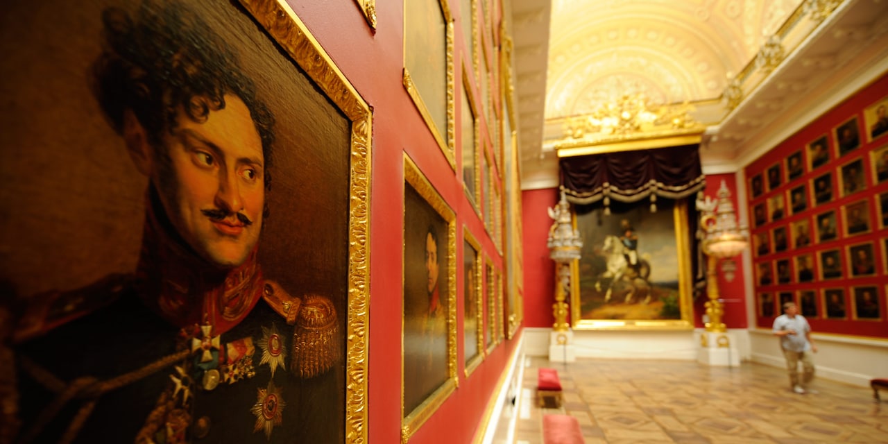 Paintings line the walls at the Hermitage Museum Paintings line the walls at the Hermitage Museum