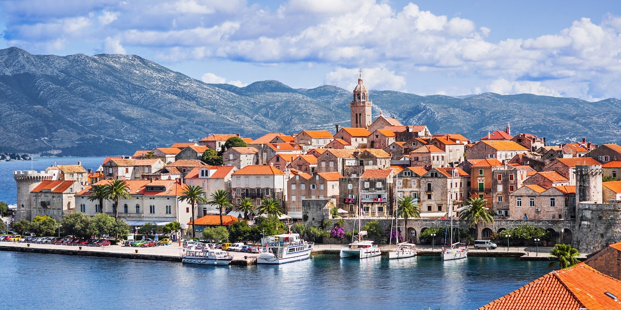 A cluster of buildings along the sea on the island of Korčula in Croatia