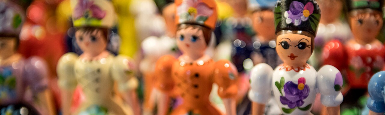 Rows of painted wooden figurines