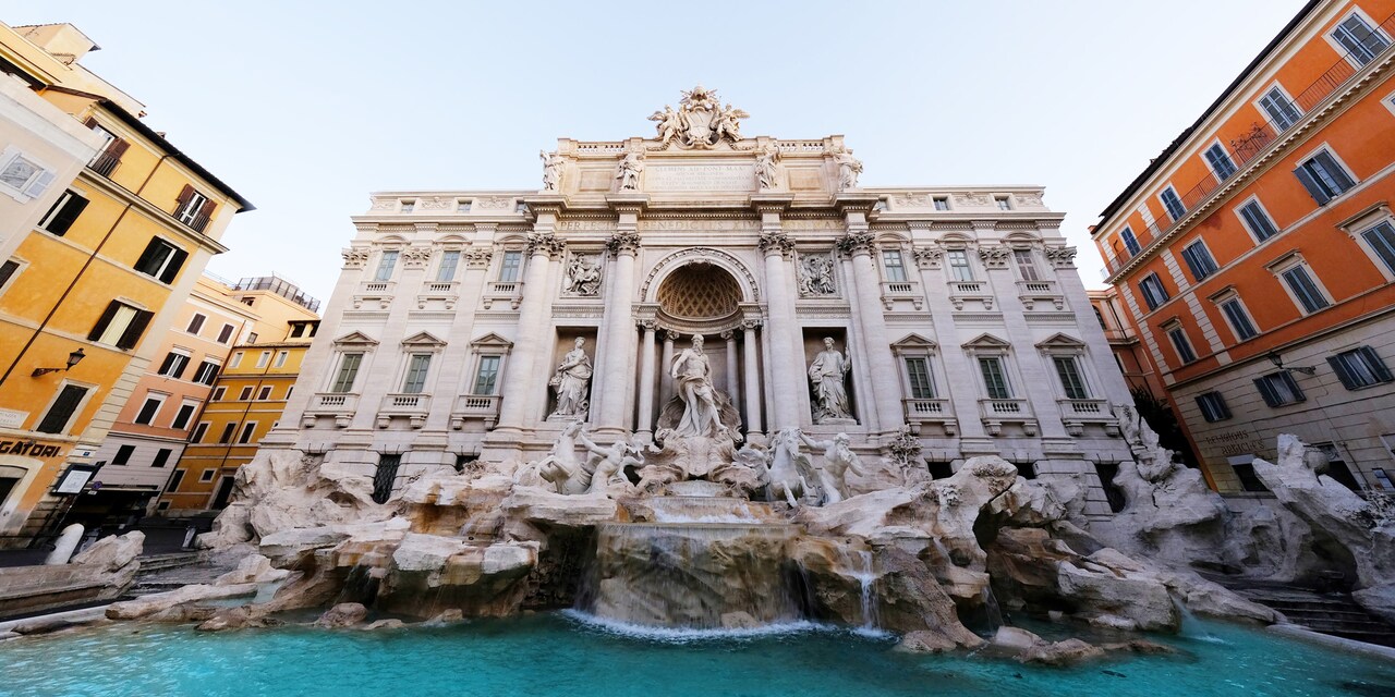 Water cascading from the Trevi Fountain in Rome