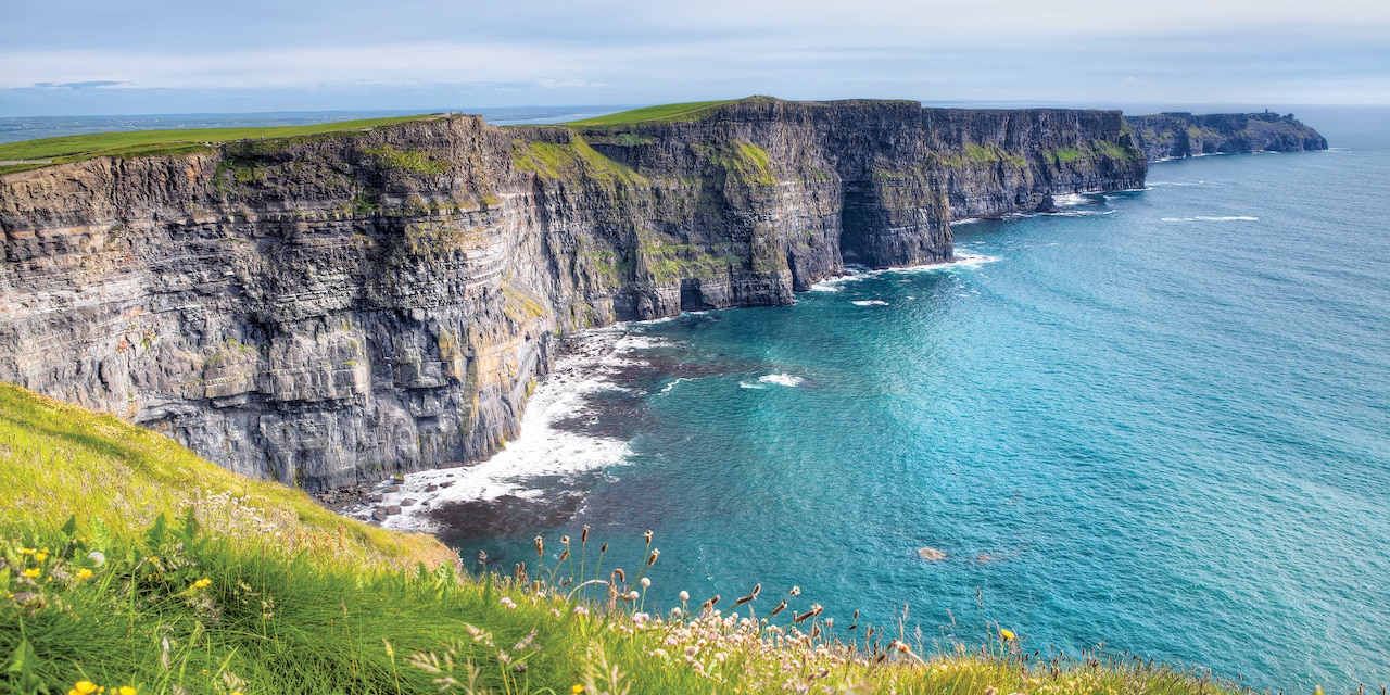 The dramatic Cliffs of Moher loom above the sea