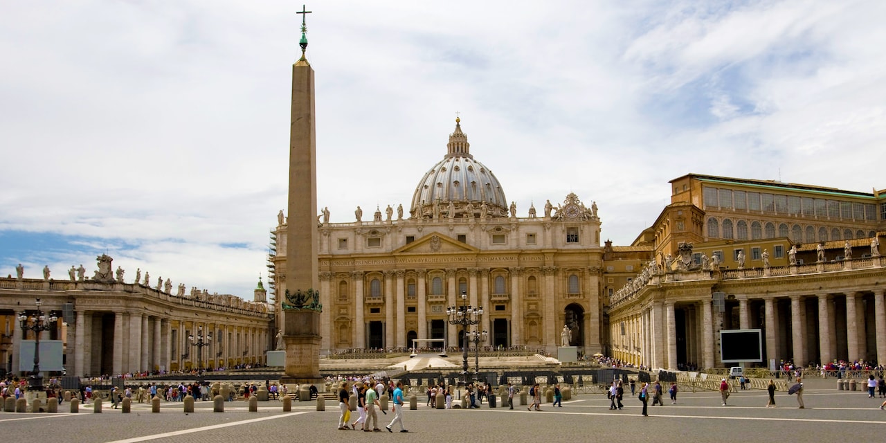 Tourists gather around St. Peter's Basilica Tourists gather around St. Peter's Basilica