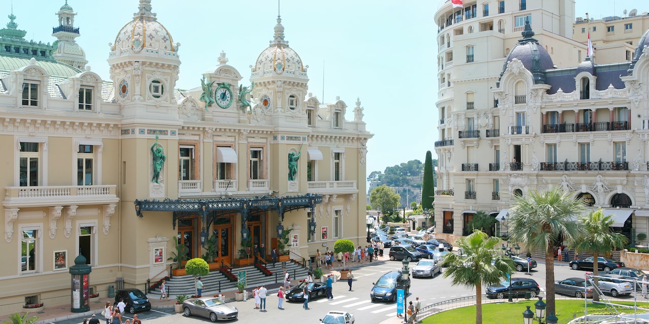 The entrance to the Monte Carlo Casino in Monaco with its ornate spires and clock tower The entrance to the Monte Carlo Casino in Monaco with its ornate spires and clock tower