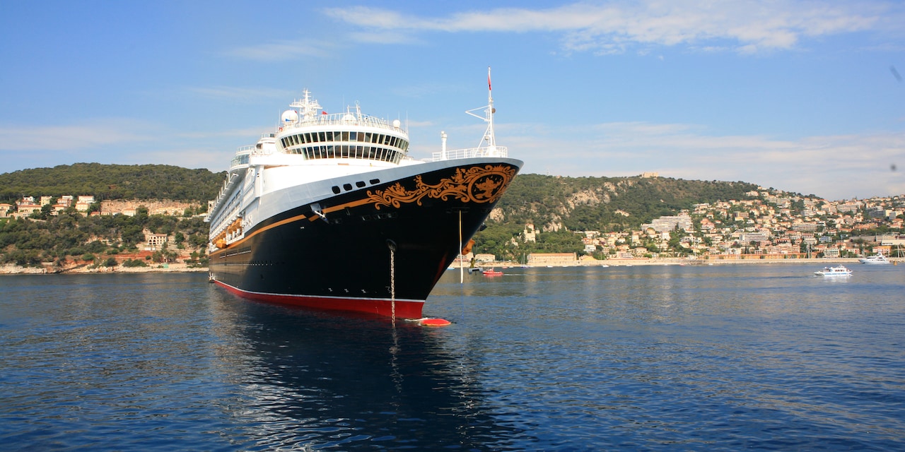 The Disney Wonder cruise ship anchored off a nearby coastline The Disney Wonder cruise ship anchored off a nearby coastline