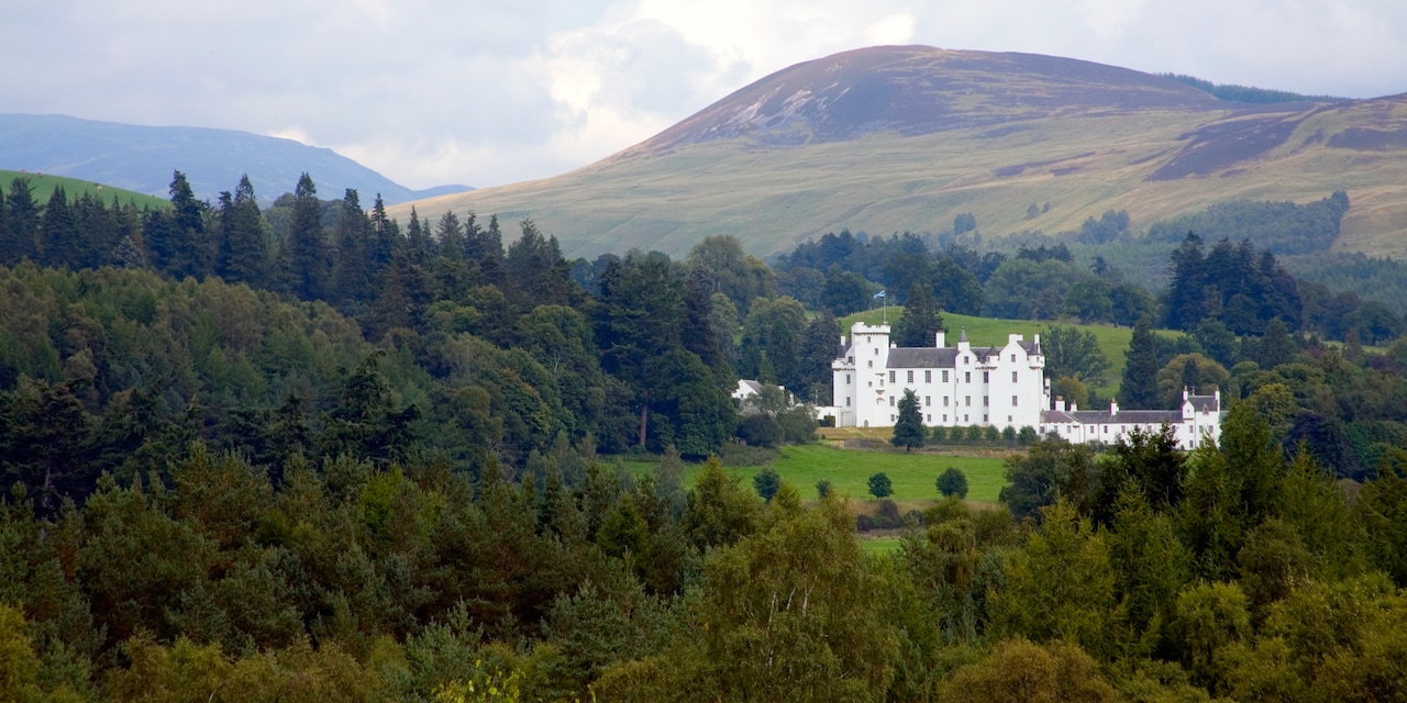 Blair Castle is nestled among the trees and hills