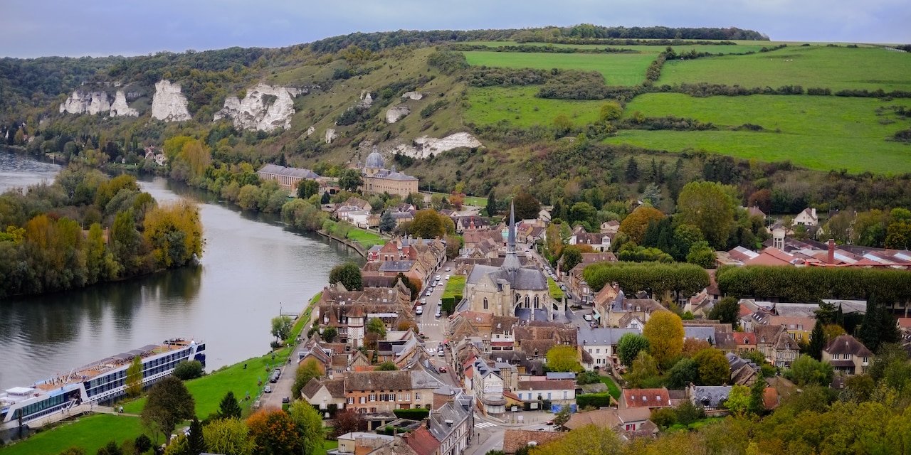 The town of Rouen, France and its white cliffs along the riverbank of the Seine River