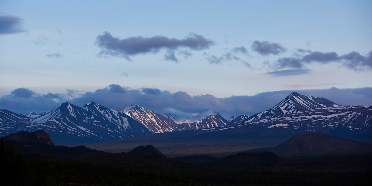 A scenic mountain range at twilight