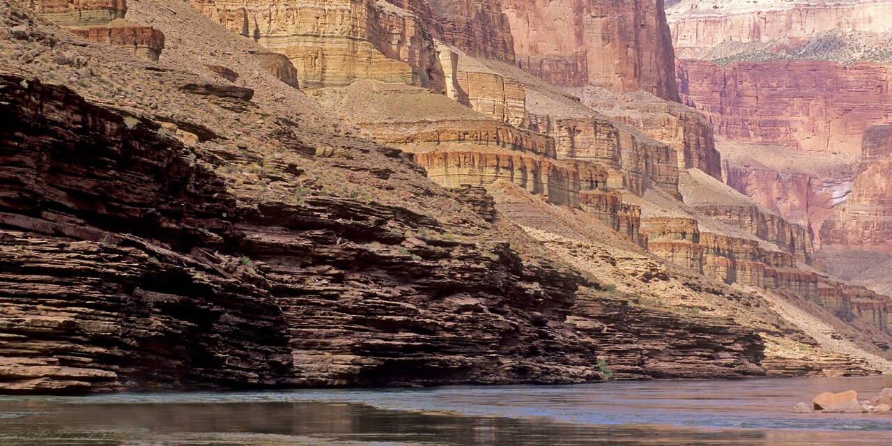 The Colorado River running through a rock canyon