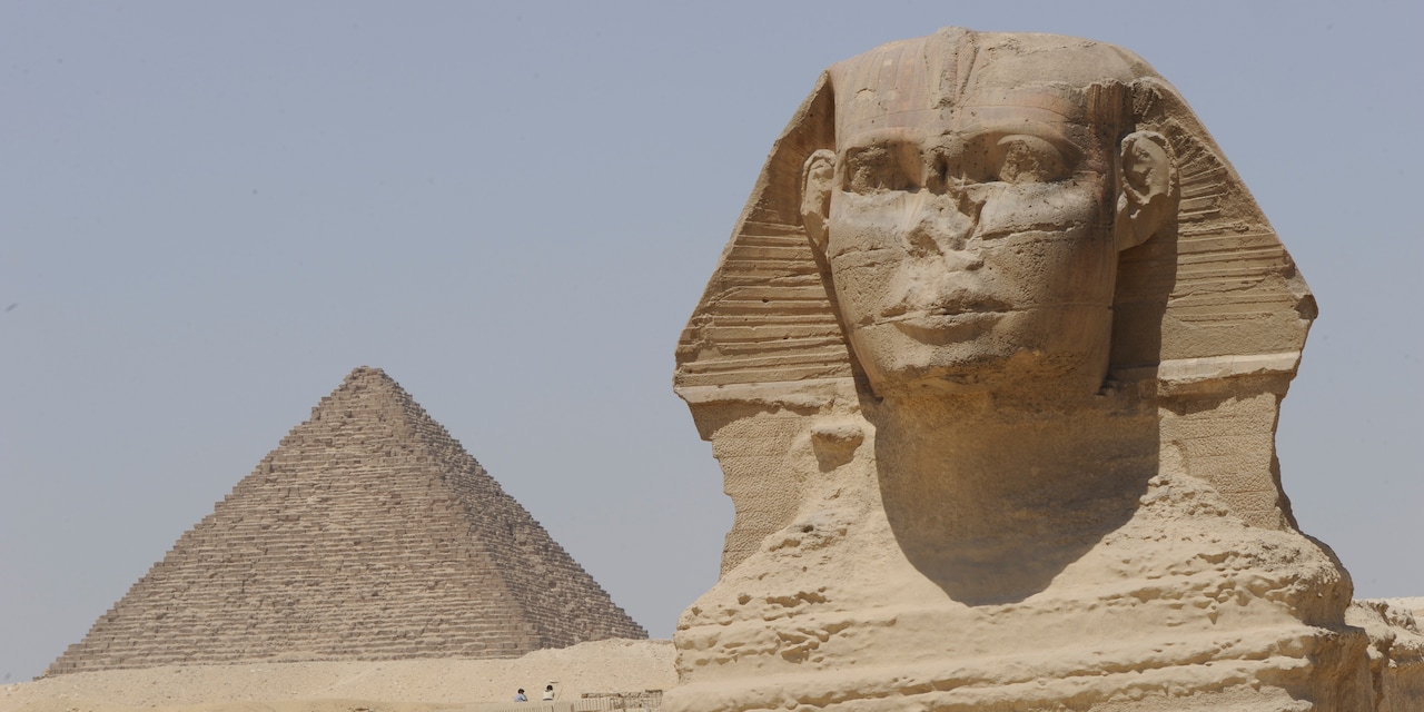 The Great Sphinx of Giza and an Egyptian pyramid