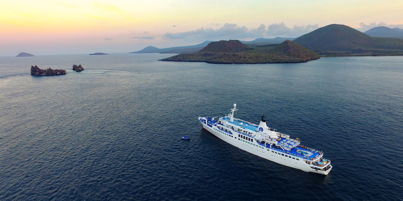 The Galápagos Legend ship sails the sea in the Galápagos archipelago